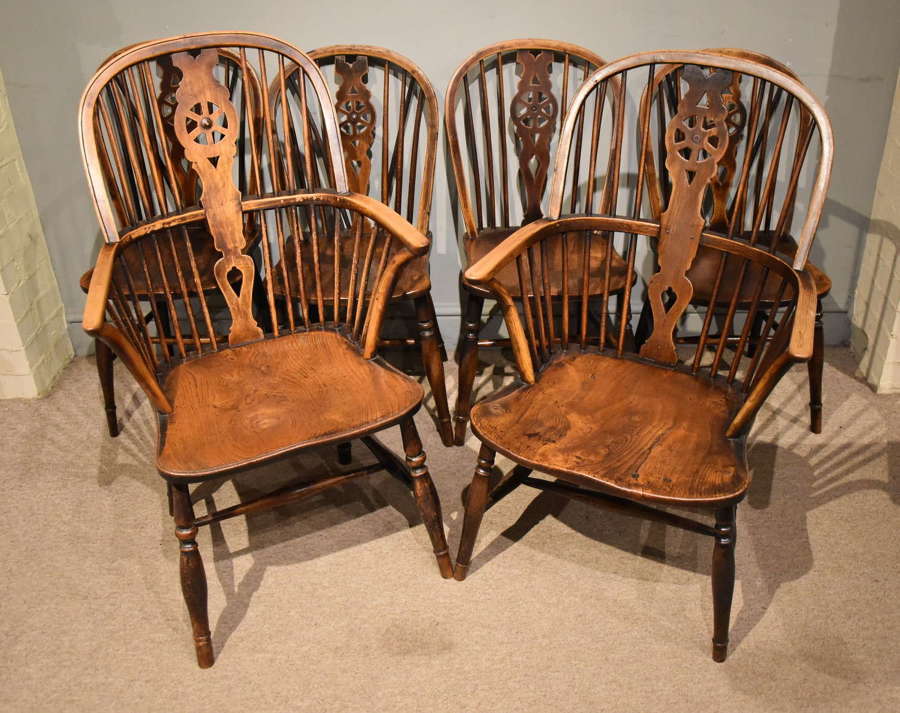 Set of Six matched Ash and Elm Wheel Back Dining Chairs