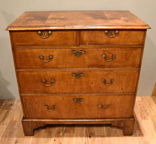 George I walnut veneered chest of drawers