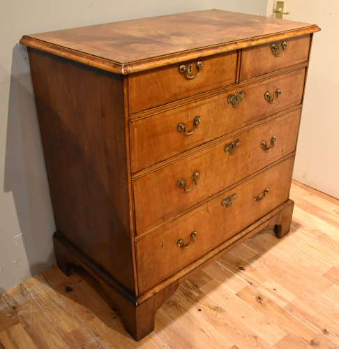 George I walnut veneered chest of drawers