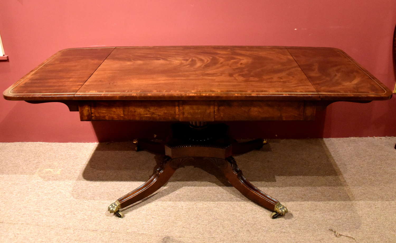 Large single pedestal Regency mahogany dining sofa table