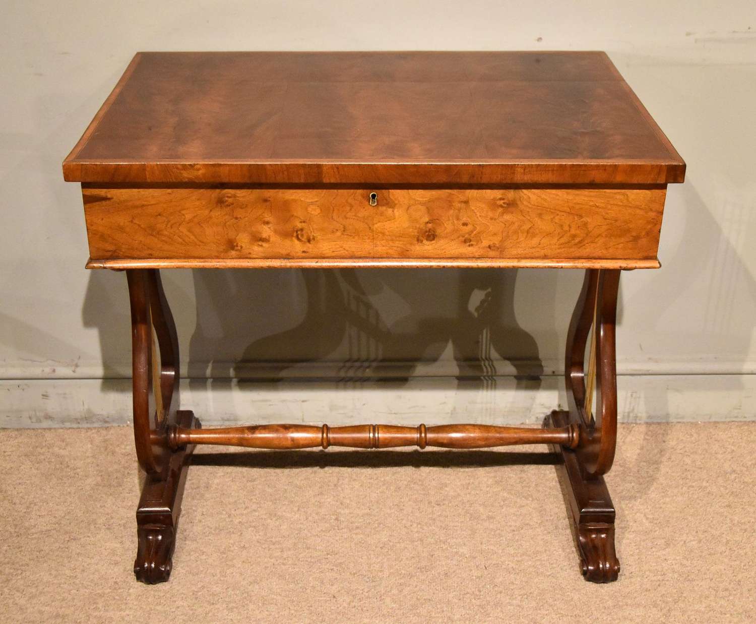 Regency period side table with flamed mahogany top