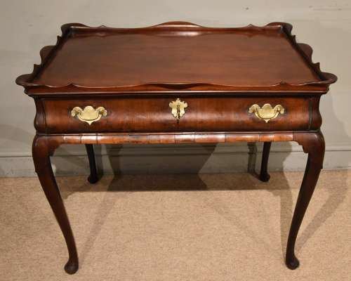 George II mahogany silver table raised on cabriole legs