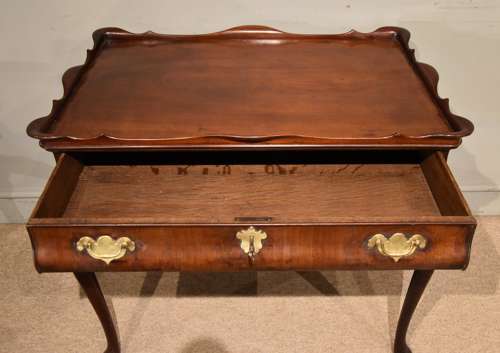 George II mahogany silver table raised on cabriole legs