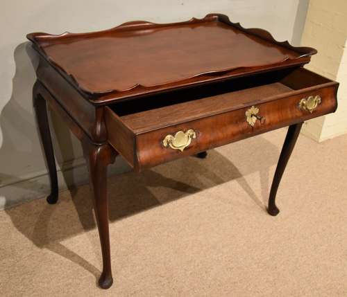George II mahogany silver table raised on cabriole legs
