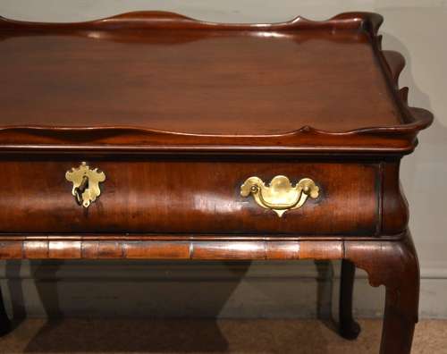 George II mahogany silver table raised on cabriole legs