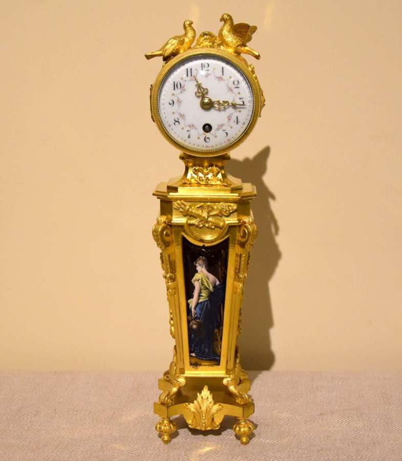 Unusual enamel mounted gilt brass mantel timepiece