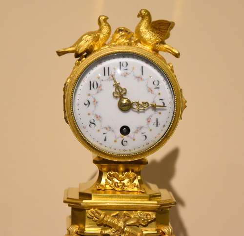 Unusual enamel mounted gilt brass mantel timepiece