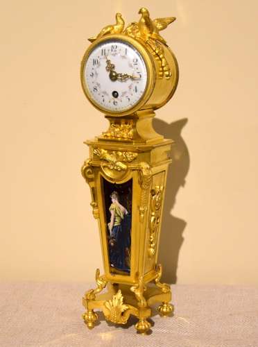 Unusual enamel mounted gilt brass mantel timepiece
