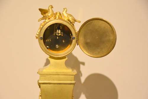 Unusual enamel mounted gilt brass mantel timepiece