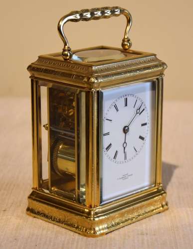 A bell striking carriage clock