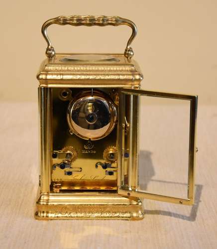 A bell striking carriage clock