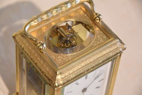A bell striking carriage clock