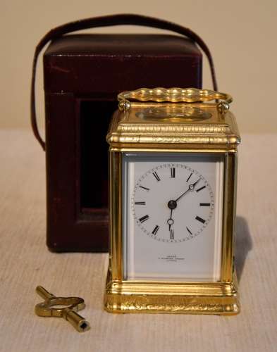 A bell striking carriage clock