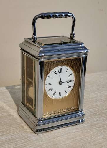 Striking carriage clock in gorge case