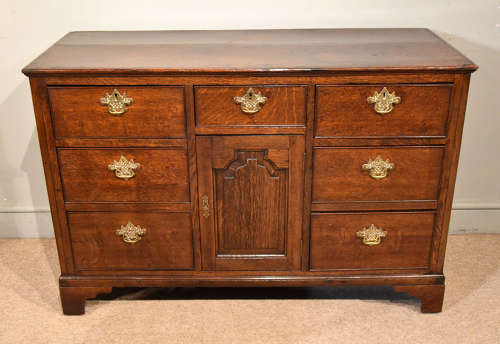 Small mid 18th century oak dresser base
