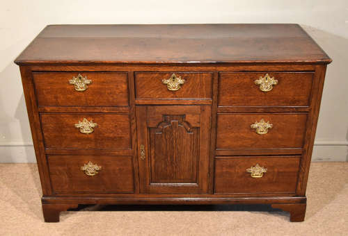 Small mid 18th century oak dresser base
