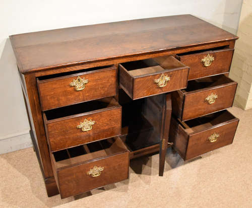 Small mid 18th century oak dresser base