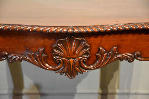 19th Century serpentine mahogany centre table