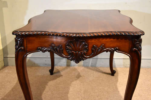 19th Century serpentine mahogany centre table