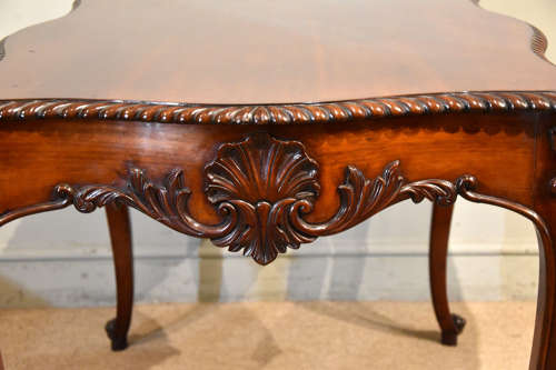 19th Century serpentine mahogany centre table