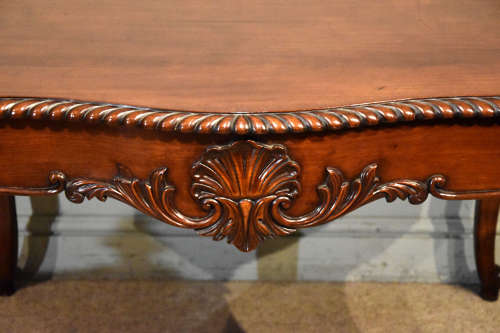 19th Century serpentine mahogany centre table