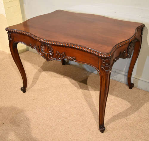 19th Century serpentine mahogany centre table