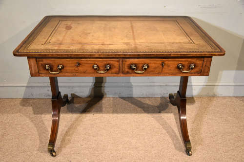 Regency writing table with trestle ends