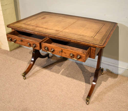 Regency writing table with trestle ends