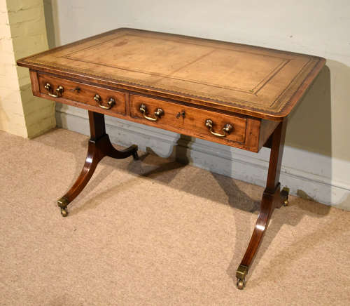 Regency writing table with trestle ends