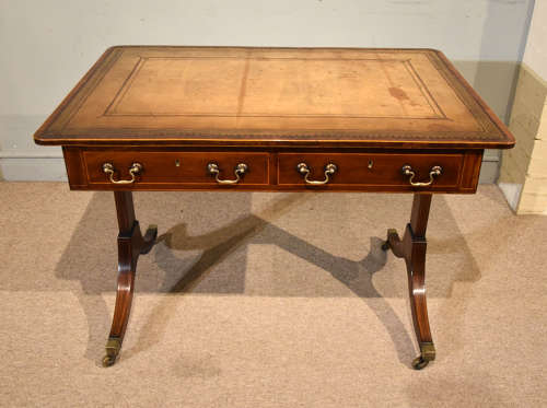 Regency writing table with trestle ends