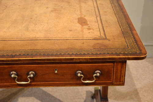 Regency writing table with trestle ends