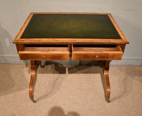 Regency satinwood kingwood leather top writing table