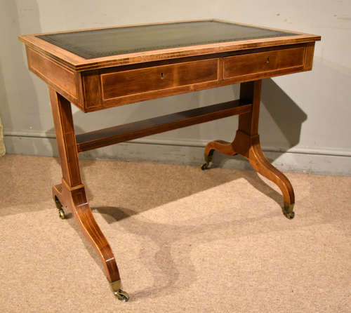 Regency satinwood kingwood leather top writing table