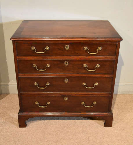 Pair of George III mahogany small chest of drawers