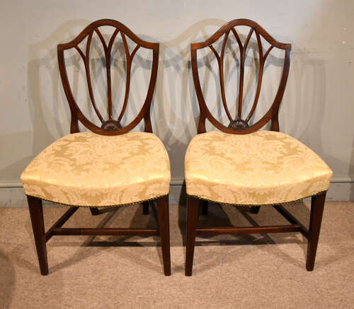 Pair of George III mahogany shield back chairs