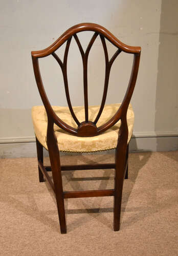 Pair of George III mahogany shield back chairs