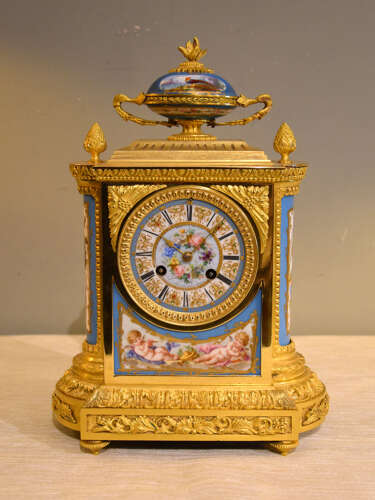 J.B Delettrez: A Porcelain and ormolu mantel clock