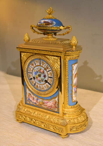 J.B Delettrez: A Porcelain and ormolu mantel clock