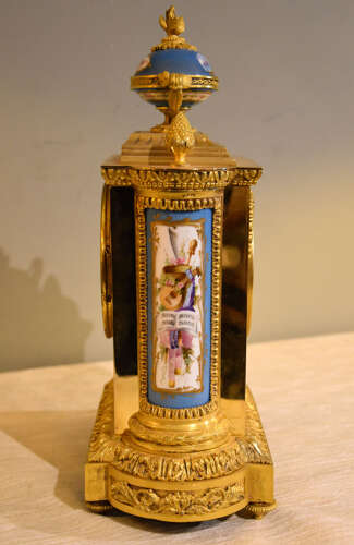 J.B Delettrez: A Porcelain and ormolu mantel clock