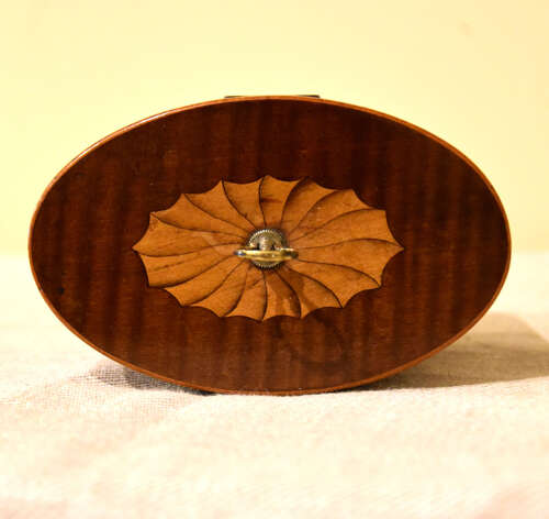 Oval Harewood tea caddy