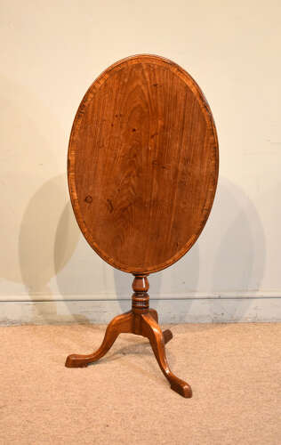 George III mahogany oval crossbanded table