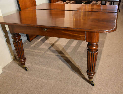 William IV mahogany four leaf dining table