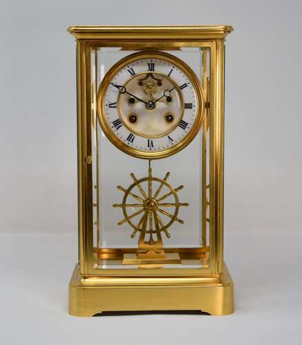 French four glass mantle clock with ships wheel