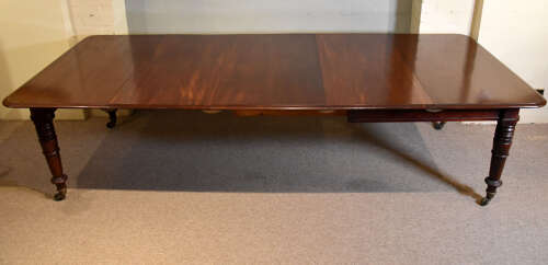 William IV mahogany three leaf dining table