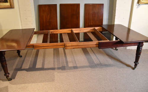 William IV mahogany three leaf dining table