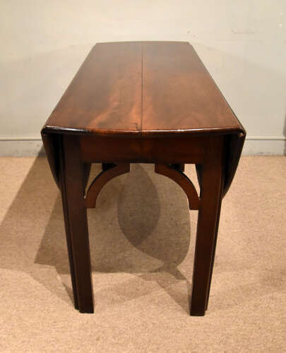 George III large oval drop leaf dining table