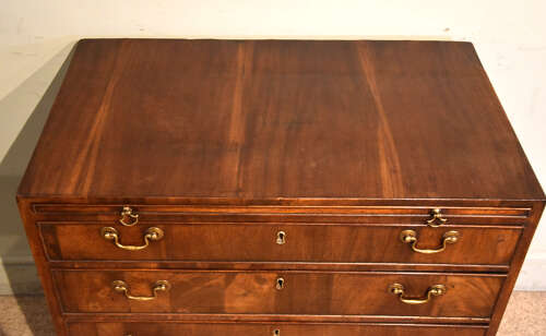 George III Virginia walnut veneered chest of drawers