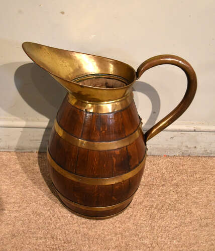 Large Victorian oak and brass bound pitcher jug