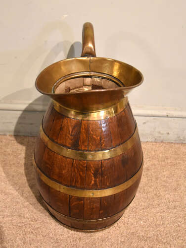 Large Victorian oak and brass bound pitcher jug