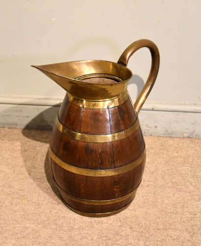 Large Victorian oak and brass bound pitcher jug
